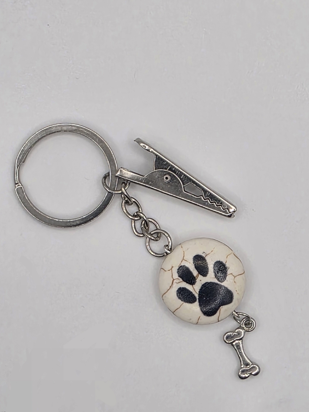 Paw Print Keychain with Bone Charm - White & Black